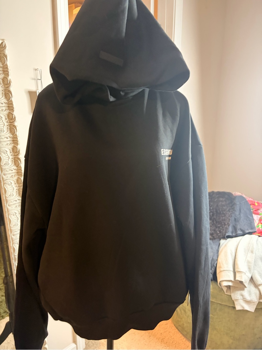 Essentials Black Pullover Hoodie with Small Chest Logo